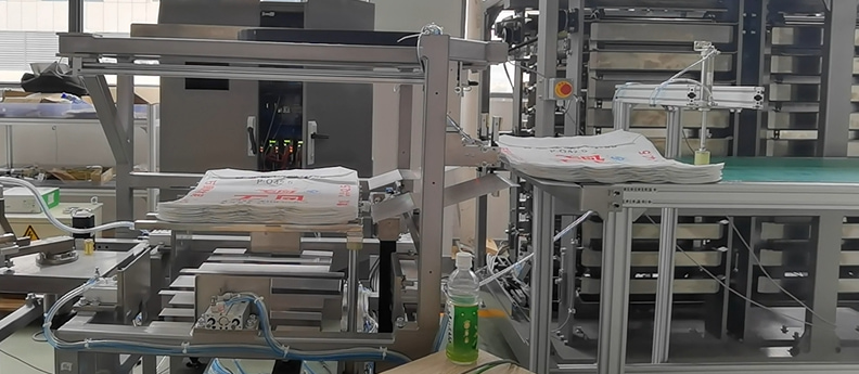 Automatic PP woven block bottom valve bag insertion machine manufacturing plant cost